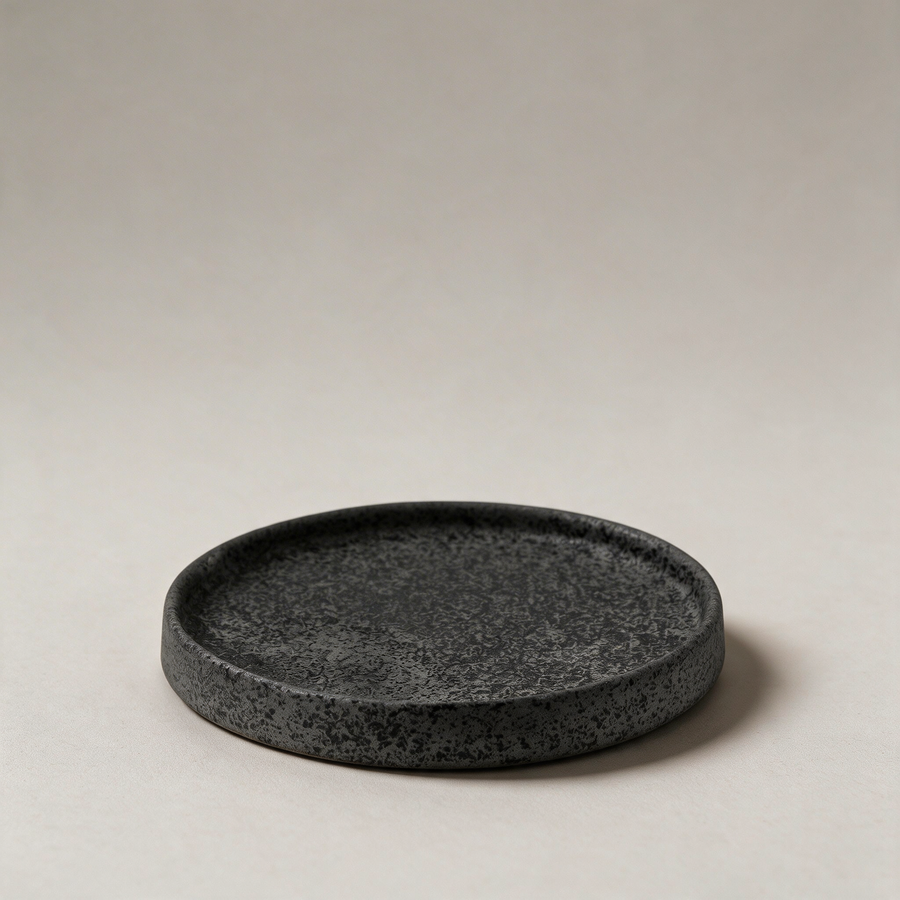 Ceramic Plate, Vulcan — restaged on warm grey studio seamless
