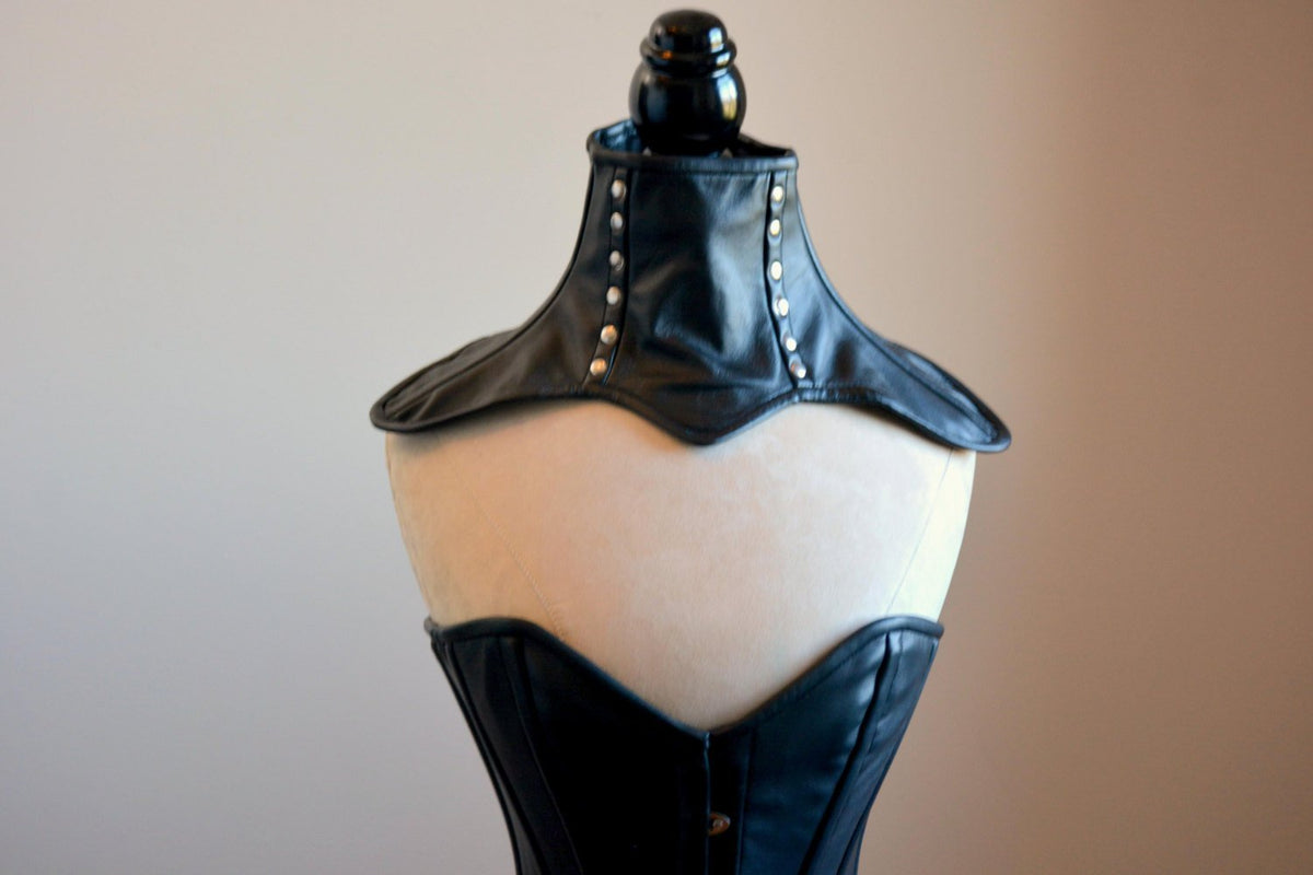 Real leather corsetted collar laced at the back